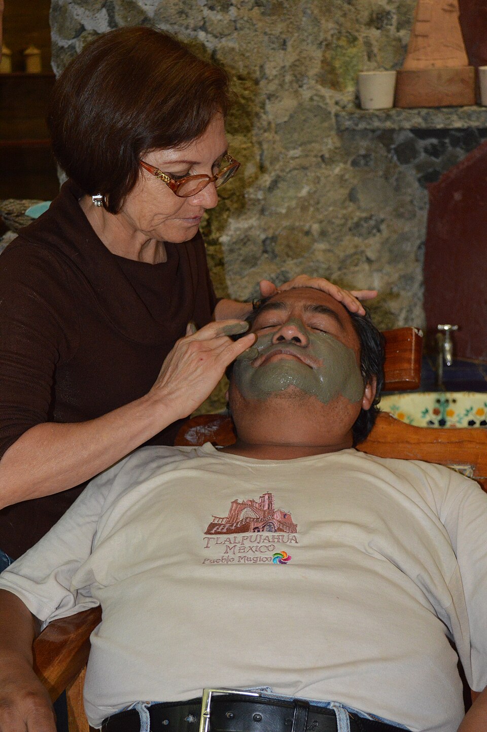 A face mask applied as a thick layer, drying on the skin
